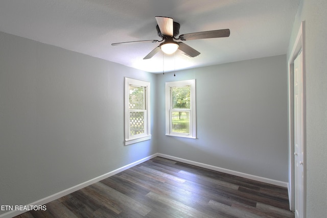 228 Pedigo Rd, Madisonville, TN 37354 - empty room featuring dark wood-style flooring and ceiling fan