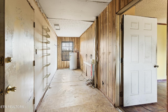 storage room featuring water heater