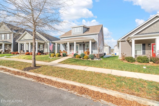 view of front of property with a front lawn and a porch