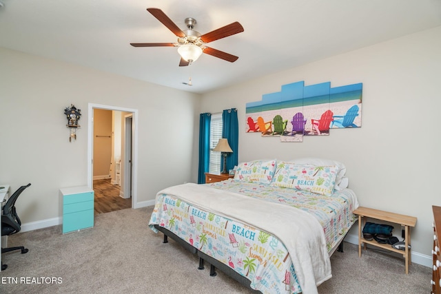 bedroom with ceiling fan and carpet floors