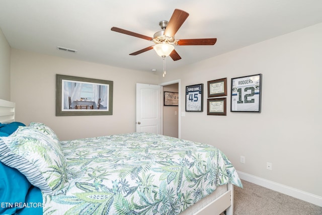 carpeted bedroom featuring ceiling fan