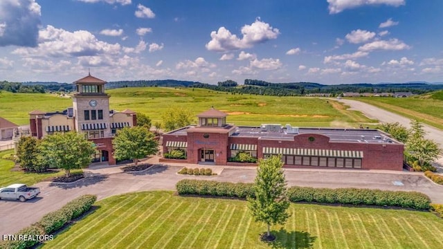 birds eye view of property featuring a rural view