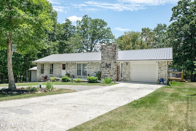 single story home with a front lawn and a garage