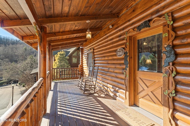 wooden deck featuring a porch