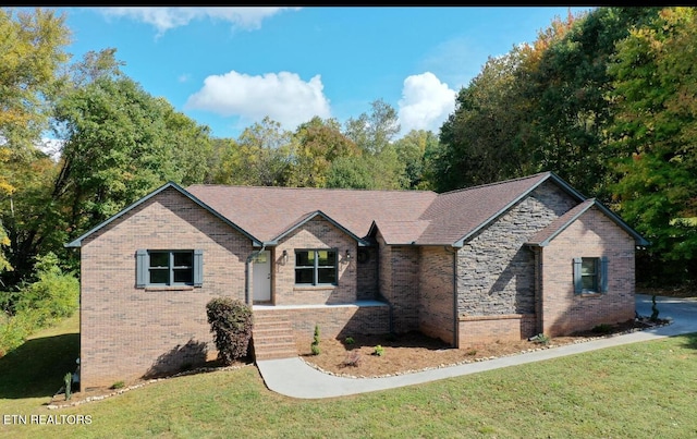 view of front of home with a front yard