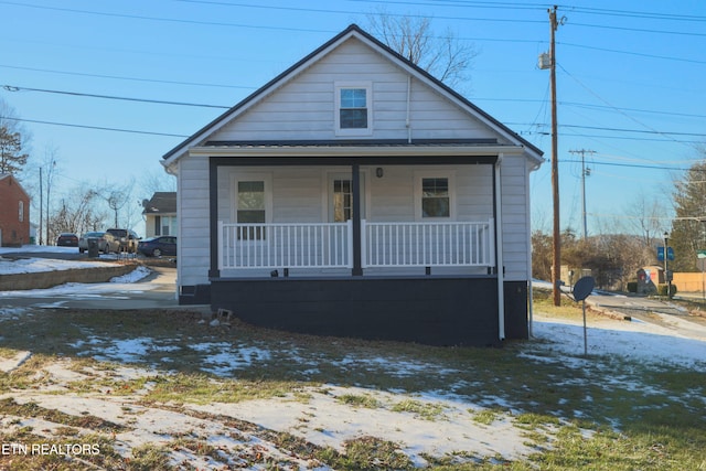 bungalow-style home featuring covered porch