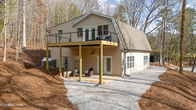 back of property with a patio area