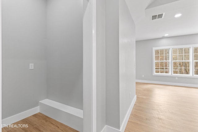 corridor featuring light hardwood / wood-style flooring