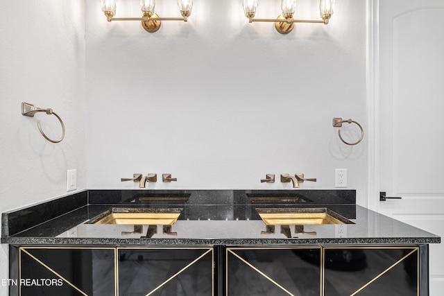 bathroom featuring dual sinks