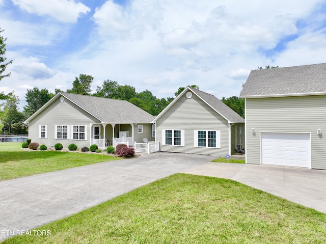 single story home featuring covered porch and a front lawn