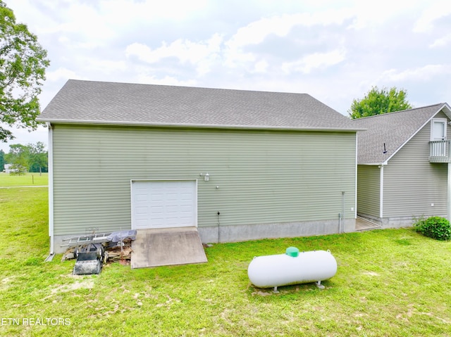 back of property featuring a lawn