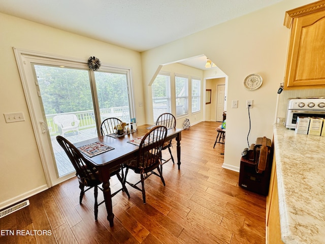 dining room with hardwood / wood-style floors