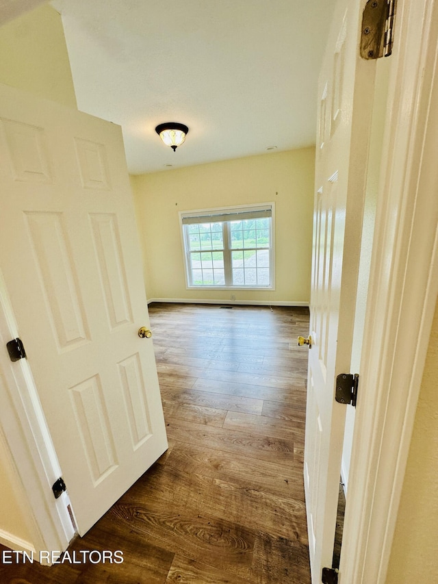 813 Clear Creek Pkwy, Clarkrange, TN 38553 - corridor featuring wood finished floors and baseboards