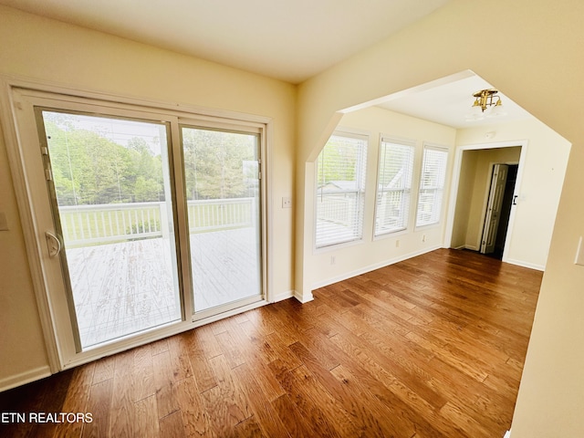 813 Clear Creek Pkwy, Clarkrange, TN 38553 - entryway featuring wood finished floors, a chandelier, and baseboards