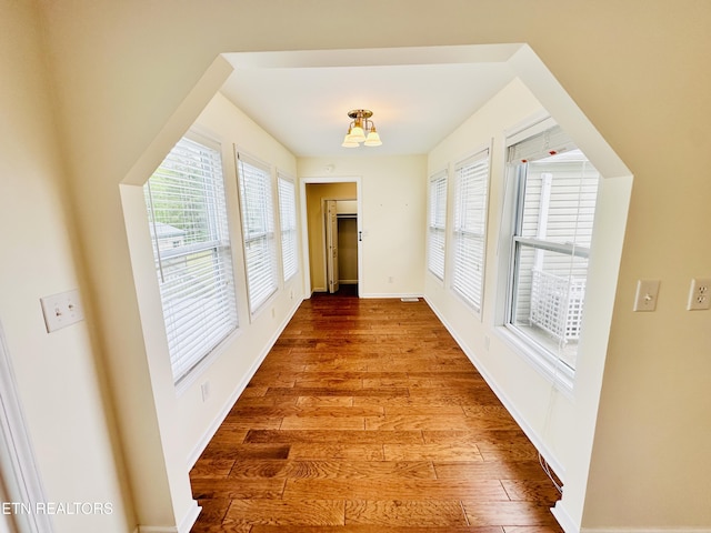 813 Clear Creek Pkwy, Clarkrange, TN 38553 - corridor featuring wood finished floors and baseboards