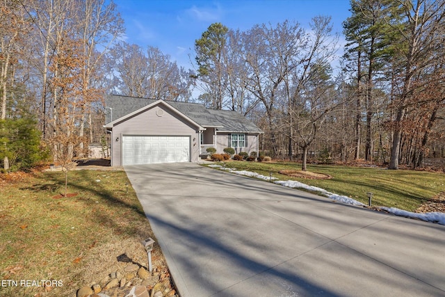 view of front facade with a garage and a front lawn