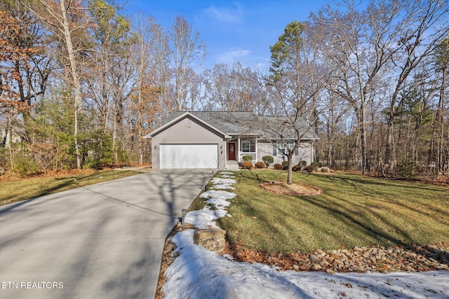 view of front of house featuring a front lawn and a garage