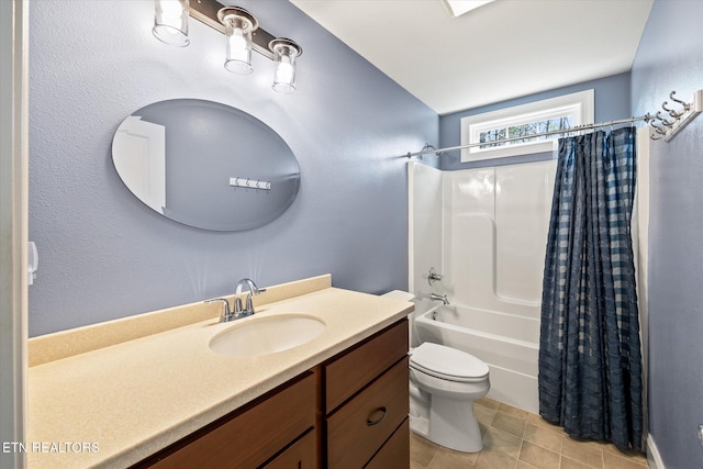 full bathroom featuring toilet, vanity, and shower / tub combo