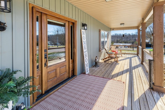 wooden terrace with covered porch