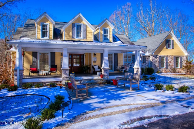 105 Charity Ln, Jamestown, TN 38556 - snow covered rear of property featuring a porch