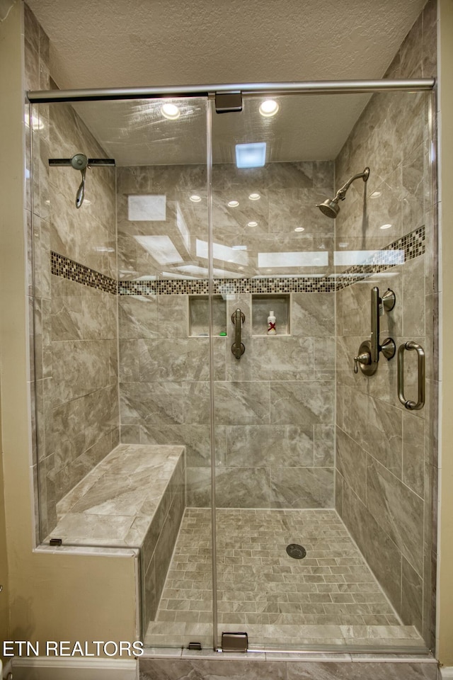 105 Charity Ln, Jamestown, TN 38556 - full bathroom featuring a shower stall, a textured ceiling, and recessed lighting