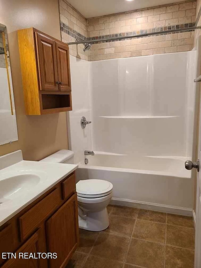 full bathroom featuring bathtub / shower combination, vanity, and toilet