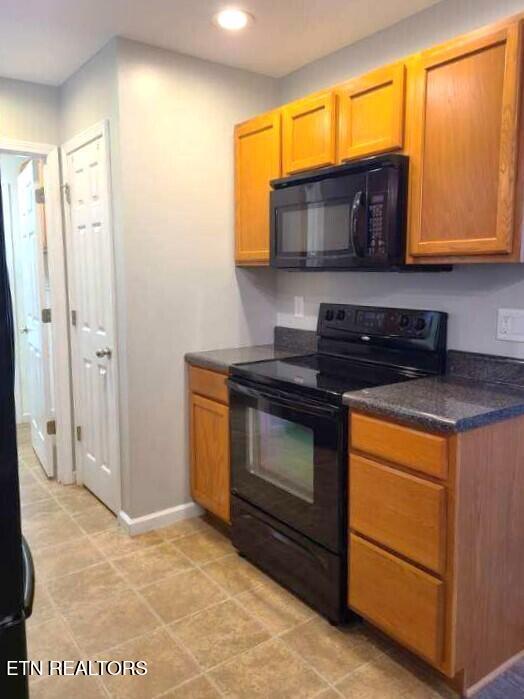 kitchen featuring black appliances