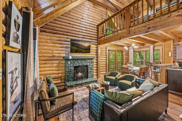 living room featuring rustic walls, wood ceiling, beam ceiling, hardwood / wood-style flooring, and a stone fireplace