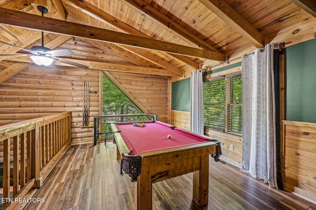 game room featuring wood-type flooring, rustic walls, ceiling fan, and pool table