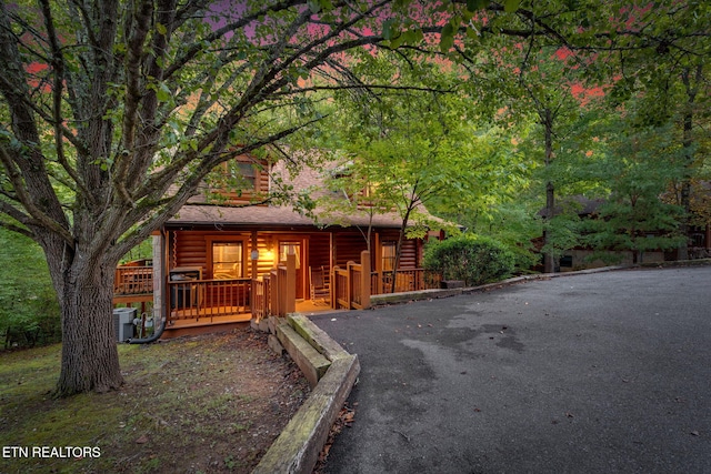 log cabin featuring central AC