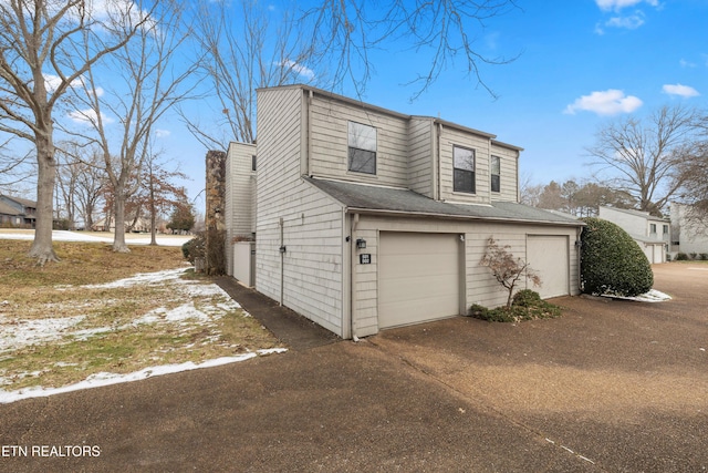 view of home's exterior featuring a garage