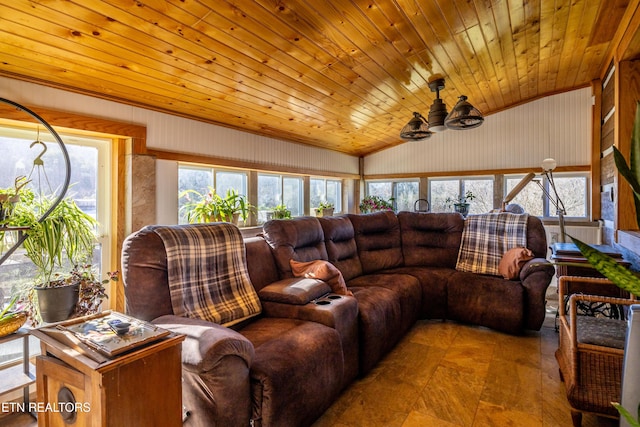 living room featuring lofted ceiling, wooden ceiling, ceiling fan, and a healthy amount of sunlight