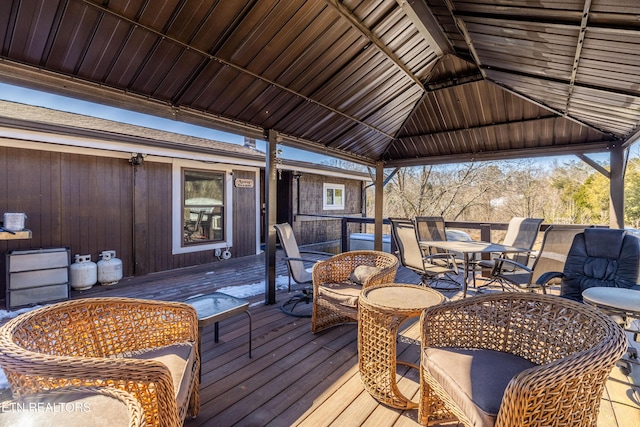 wooden deck featuring a gazebo