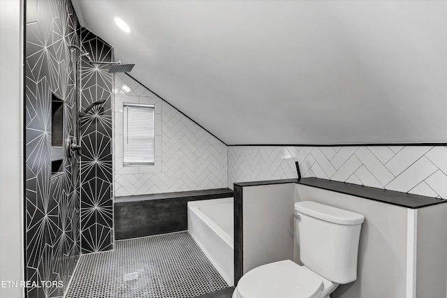 bathroom featuring tile patterned floors, shower with separate bathtub, tile walls, and toilet