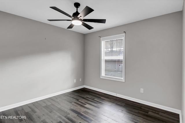 unfurnished room featuring dark hardwood / wood-style flooring and ceiling fan