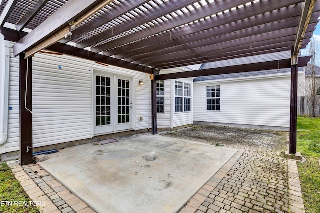 view of patio with a pergola and french doors