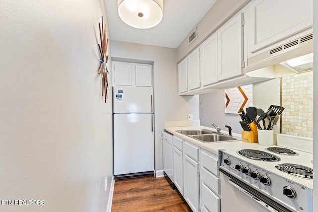 kitchen with white appliances, dark hardwood / wood-style floors, white cabinetry, and sink