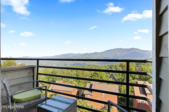 balcony featuring a mountain view