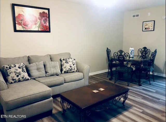 living room featuring hardwood / wood-style flooring