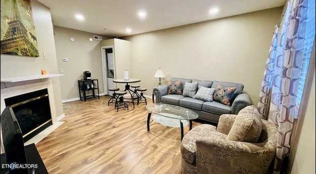 living room featuring light wood-type flooring