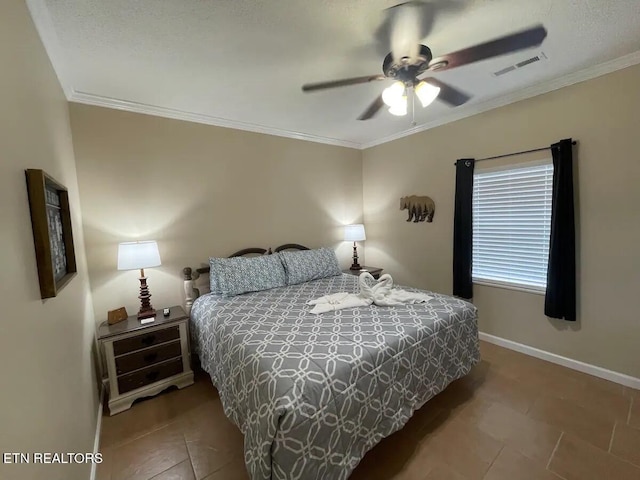 bedroom with a textured ceiling, tile patterned floors, ceiling fan, and crown molding