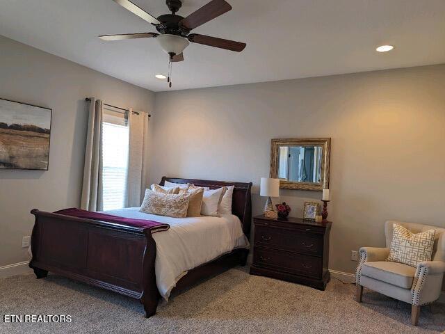 carpeted bedroom featuring recessed lighting, ceiling fan, and baseboards