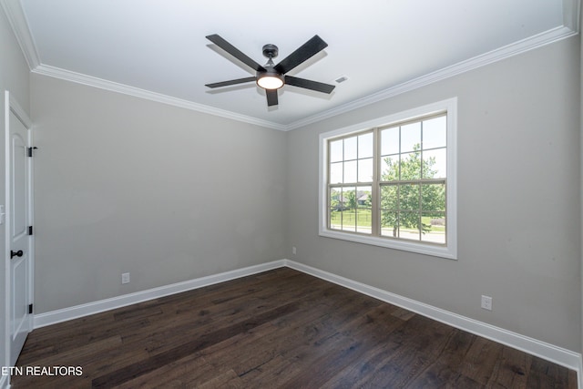 unfurnished room with baseboards, ornamental molding, dark wood-style floors, a ceiling fan, and visible vents