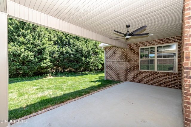 view of patio featuring a ceiling fan