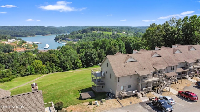 bird's eye view with a water view