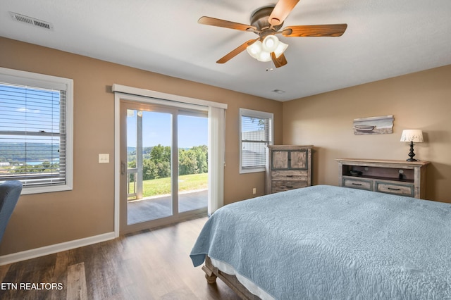 bedroom with light wood-type flooring, access to outside, and ceiling fan