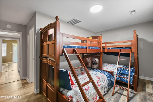 bedroom featuring hardwood / wood-style flooring