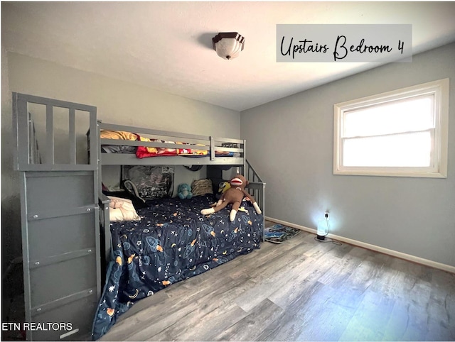 bedroom featuring hardwood / wood-style flooring