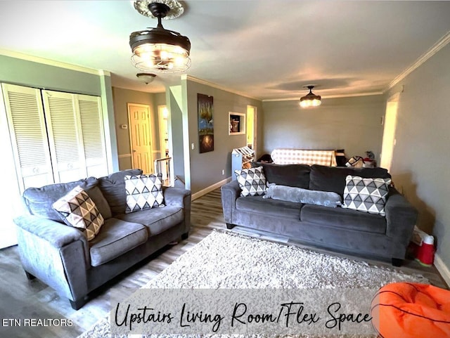 living room featuring crown molding and dark hardwood / wood-style flooring