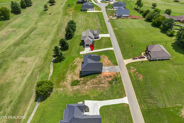 bird's eye view with a rural view